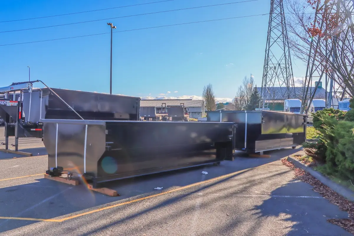 Roll-off dumpster ready for waste disposal at job site for 12 Yard Dumpster Rental in Pensacola Station